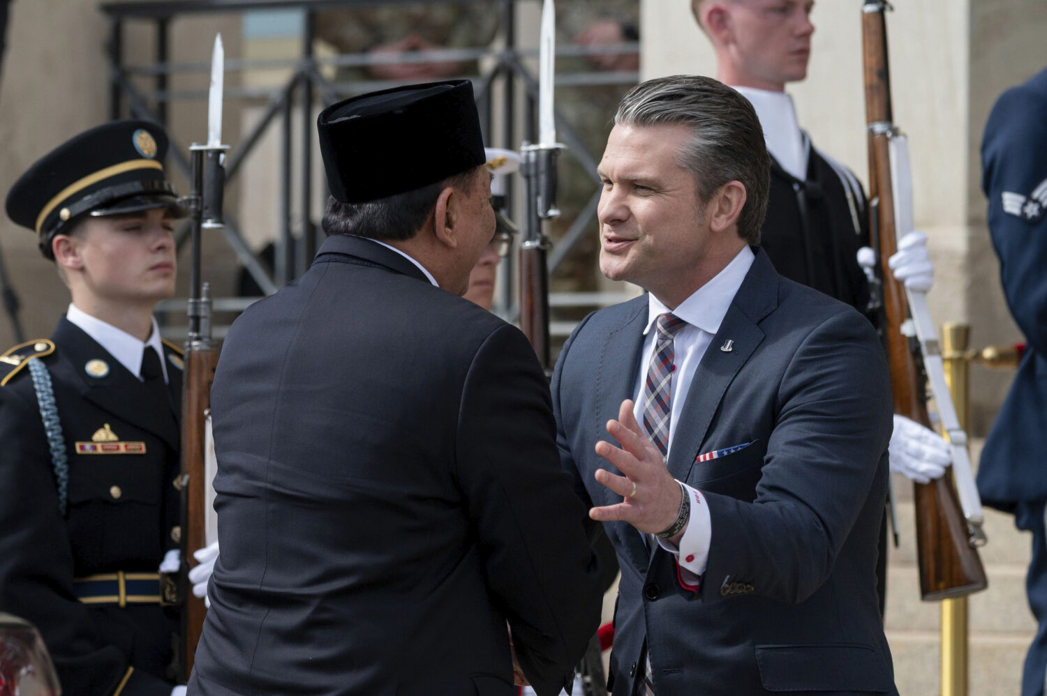 Defense Secretary Pete Hegseth, right, welcomes Minister of Defense for Indonesia Sjafrie Sjamsoedd...
