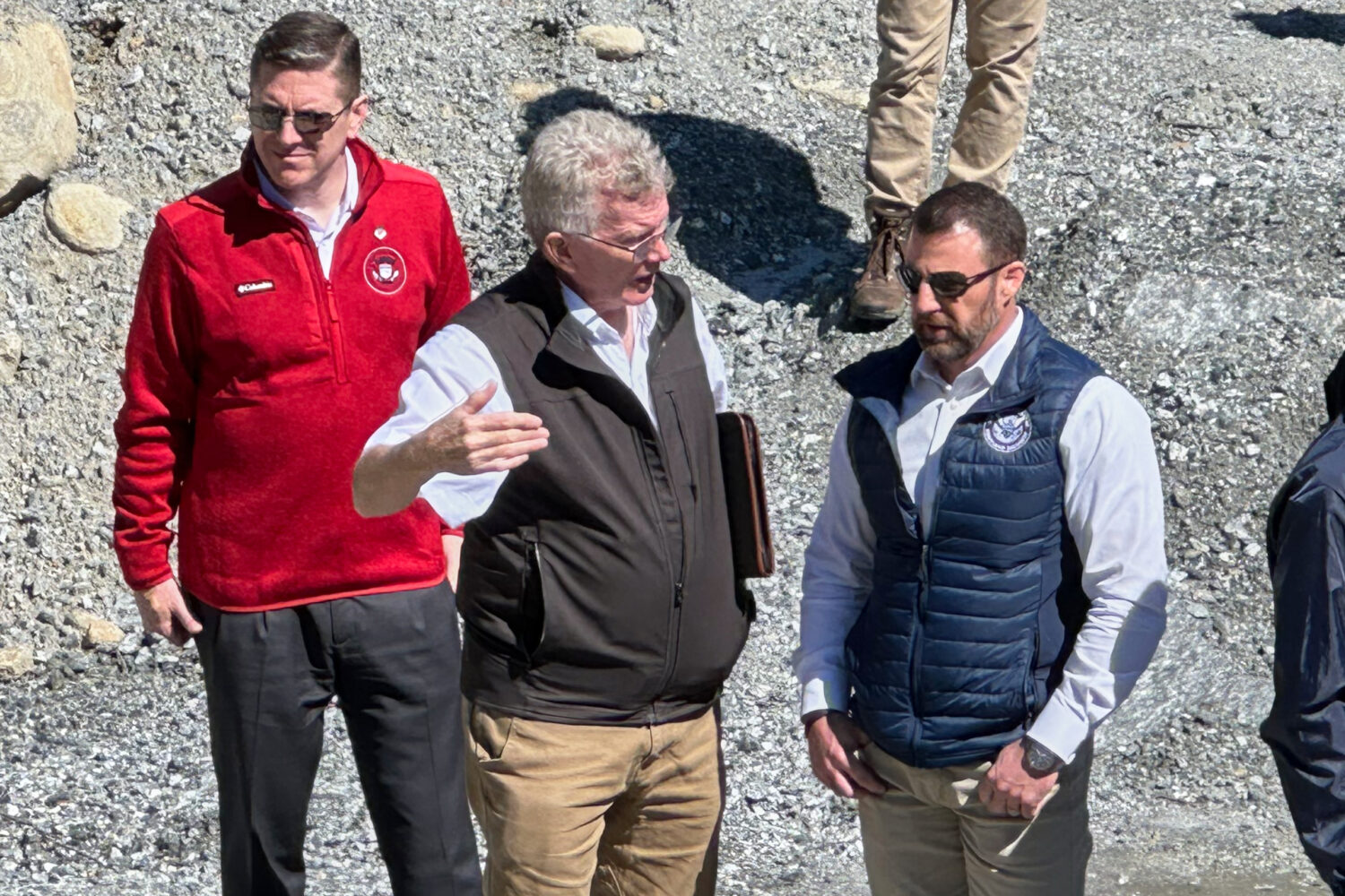 Homeland Security Secretary Markwayne Mullin, right, talks with Mayor Peter O'Leary, during a trip ...
