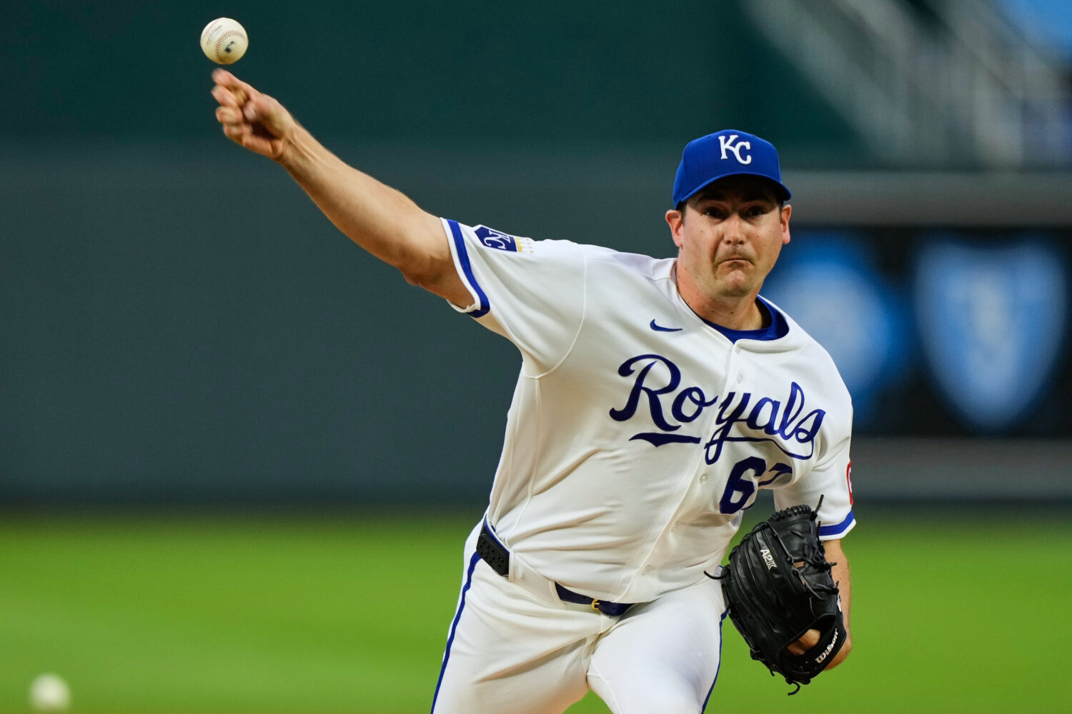 Kansas City Royals starting pitcher Seth Lugo throws during the first inning of a baseball game aga...