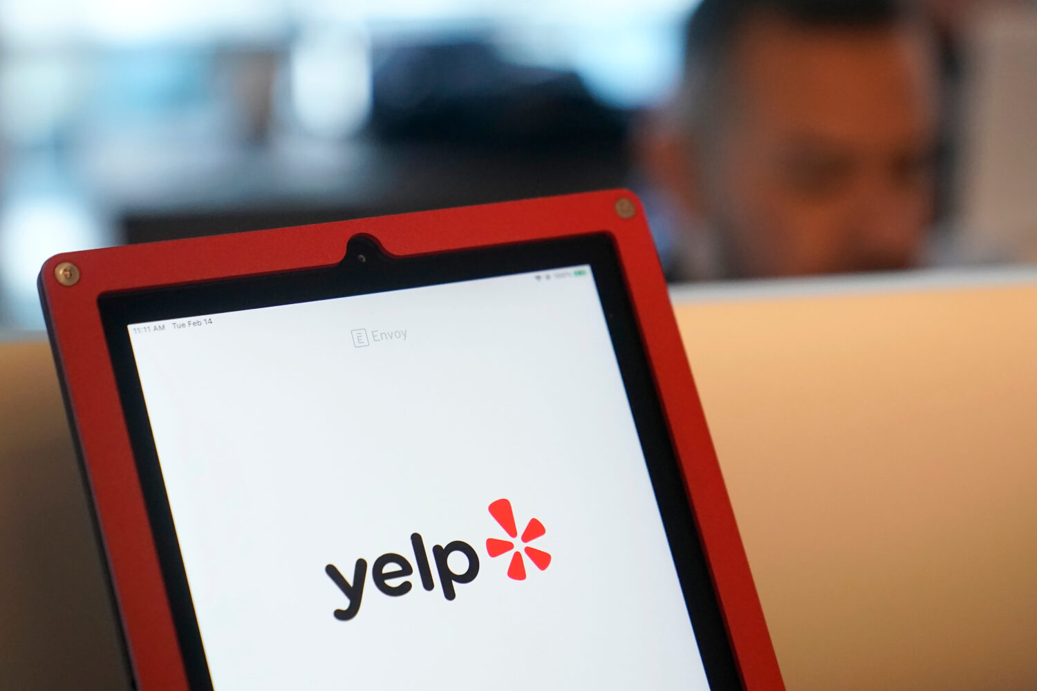 FILE - A Yelp logo is shown on a tablet at the company's office, in San Francisco, Feb. 14, 2023. (...