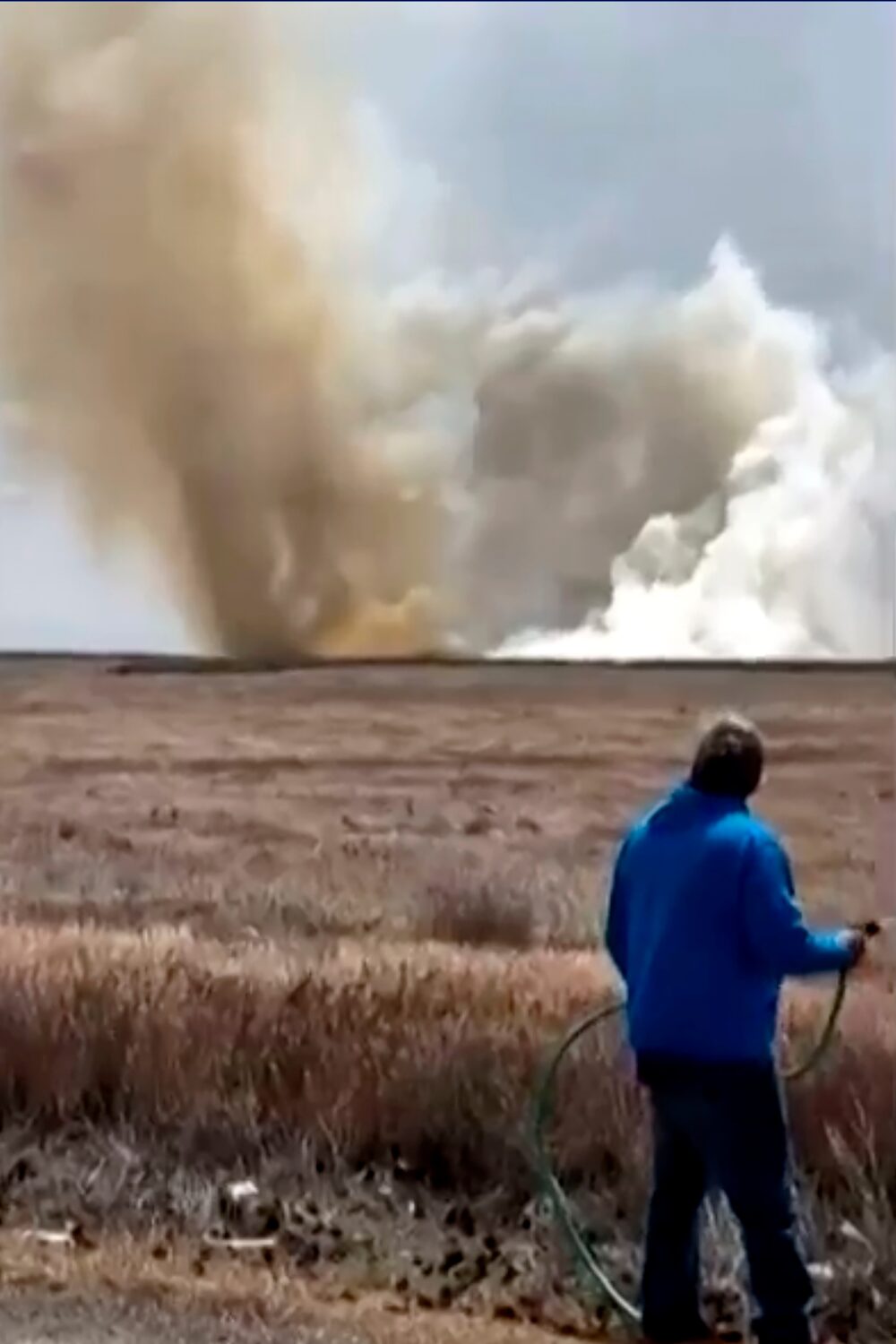This still image taken from video shows a plume of smoke rising above a plain near Mountain Home Ai...