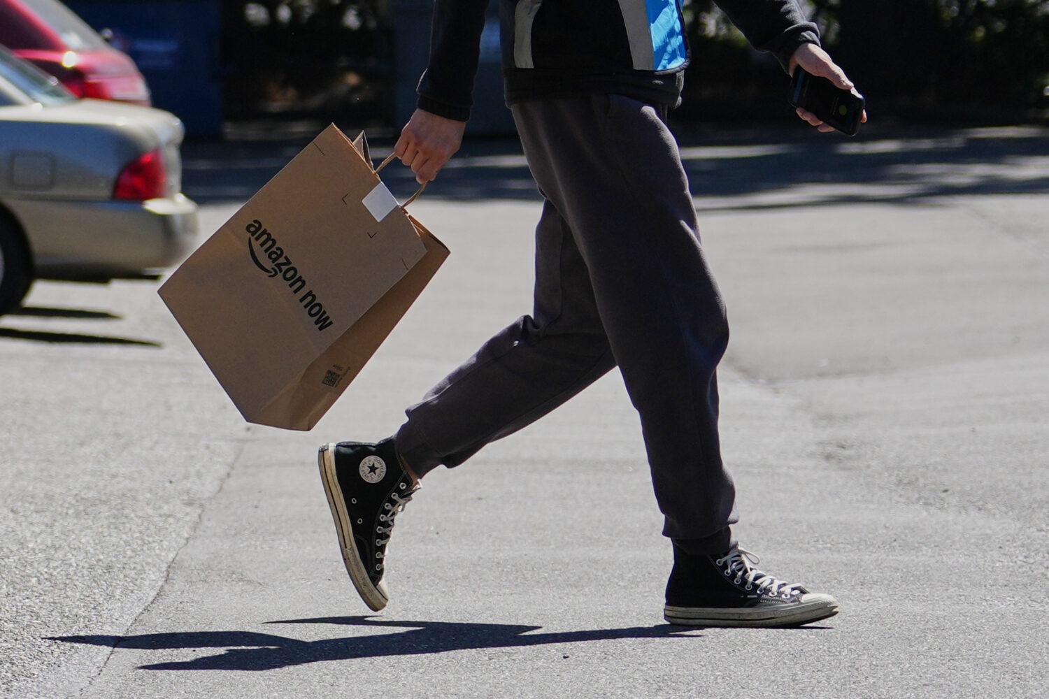 A driver picks up an order at an Amazon Now location, Monday, May 11, 2026, in Bellevue, Wash. (AP ...