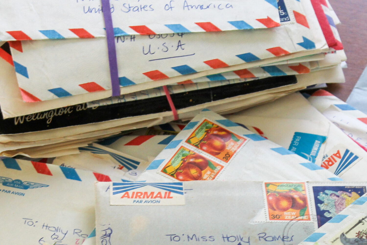 Some of the hundreds of letters AP reporter Holly Ramer has received from her pen pal in New Zealan...