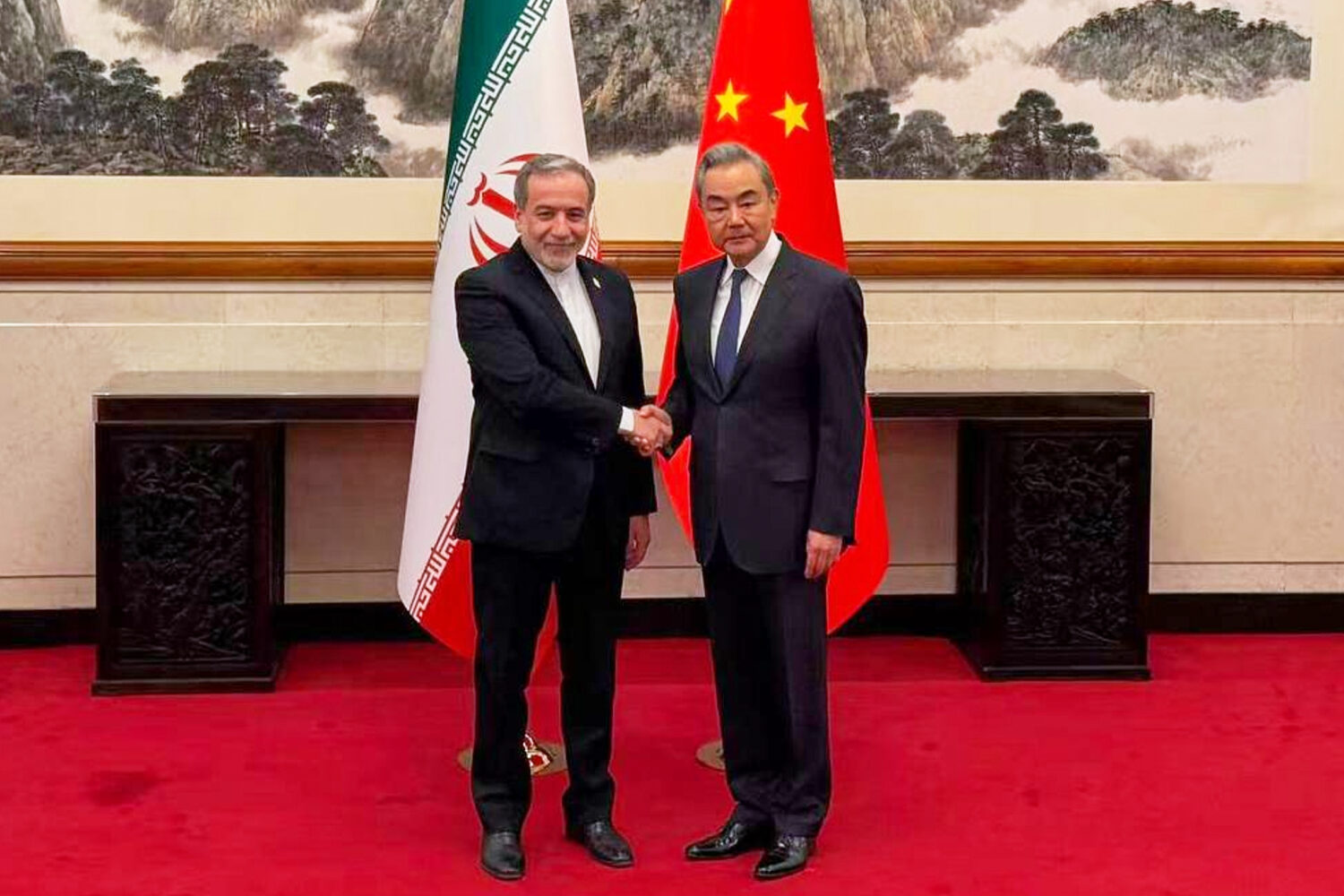 In this photo released by the Telegram channel of Iranian Foreign Minister Abbas Araghchi, China's ...
