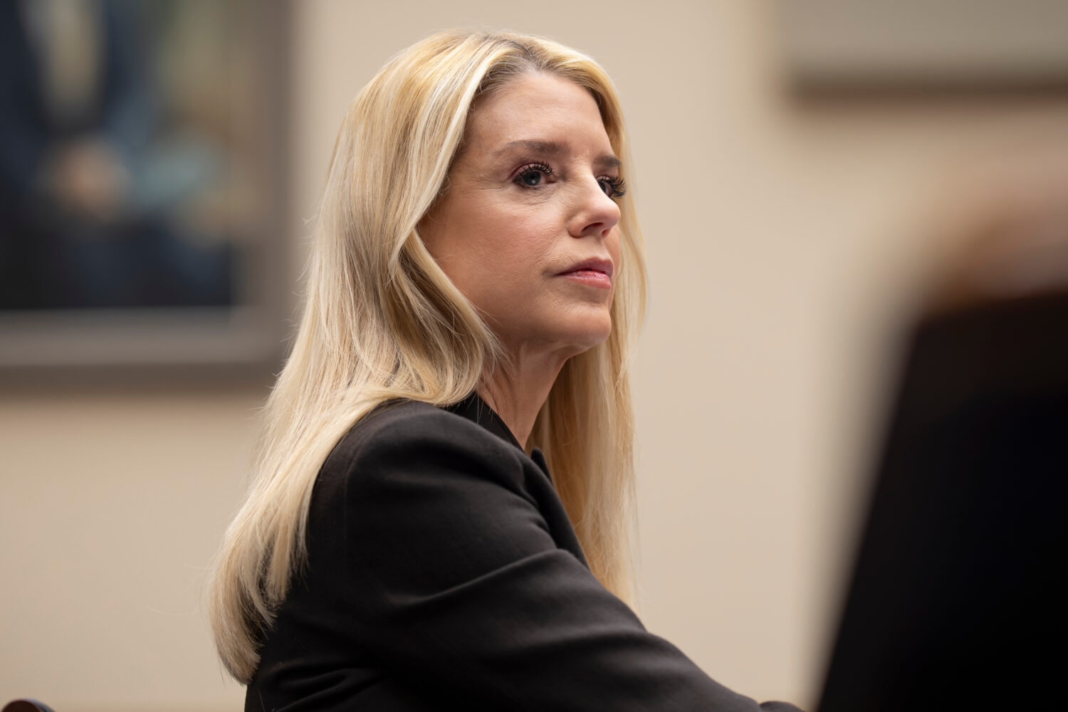 FILE - Attorney General Pam Bondi faces questions in the House Judiciary Committee over the Justice...