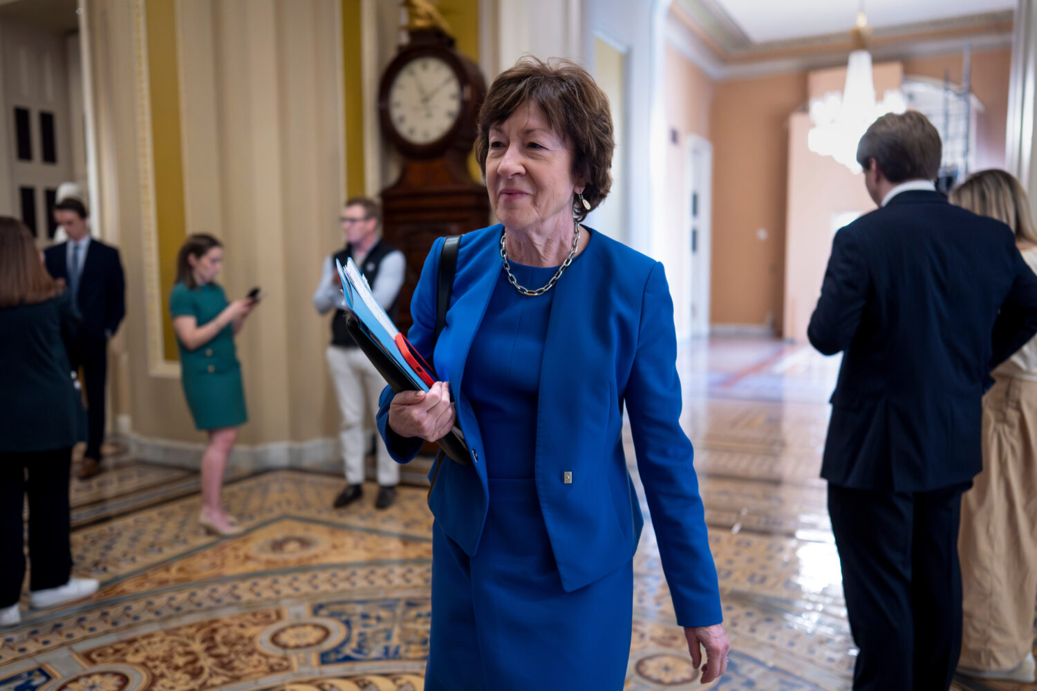 FILE - Senate Appropriations Committee Chair Susan Collins, R-Maine, walks to the chamber after mee...