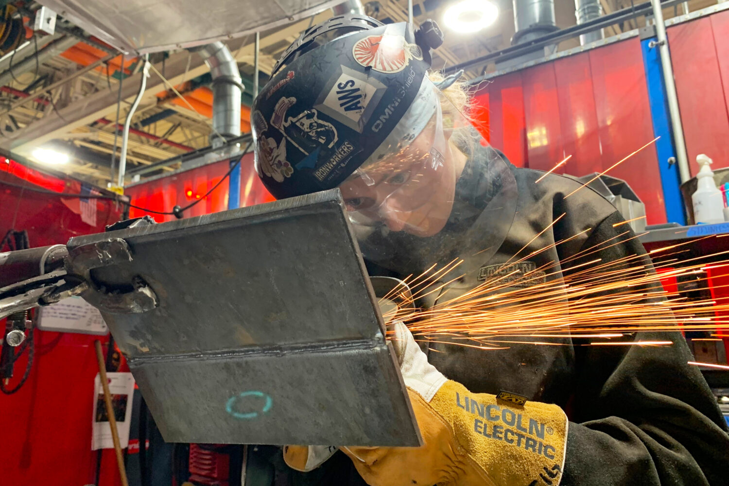 Student Mikala Sposito welds at Washtenaw Community College on Friday, May 1, 2026, in Ann Arbor., ...