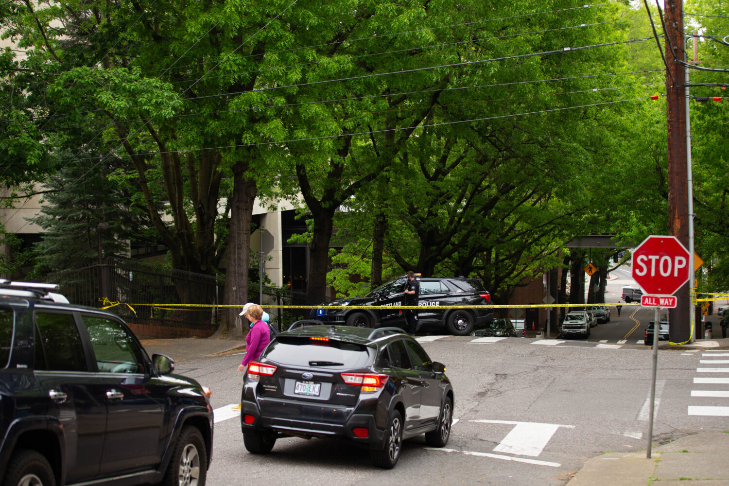 Police shut down the block surrounding the Multnomah Athletic Club in Northwest Portland, Ore., on ...