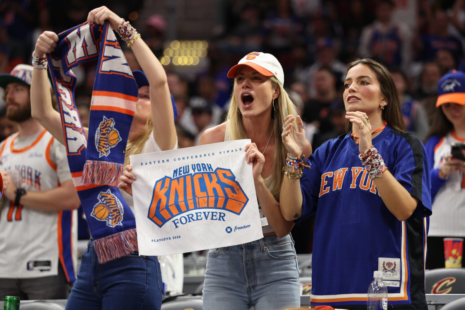 New York Knicks fans cheer during the second half of Game 4 in the Eastern Conference finals NBA ba...