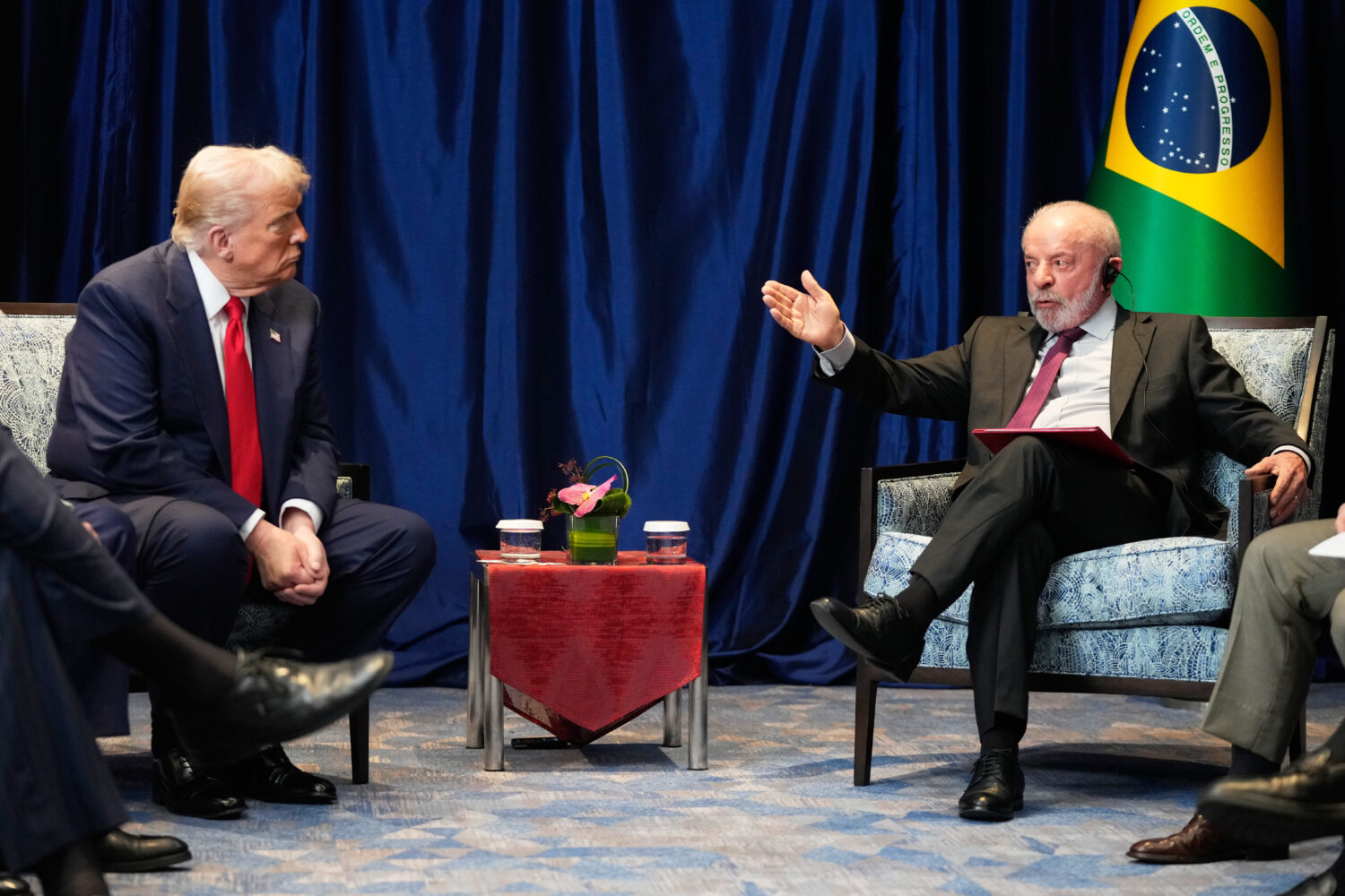 FILE - President Donald Trump meets with Brazil's President Luiz Inacio Lula da Silva on the sideli...