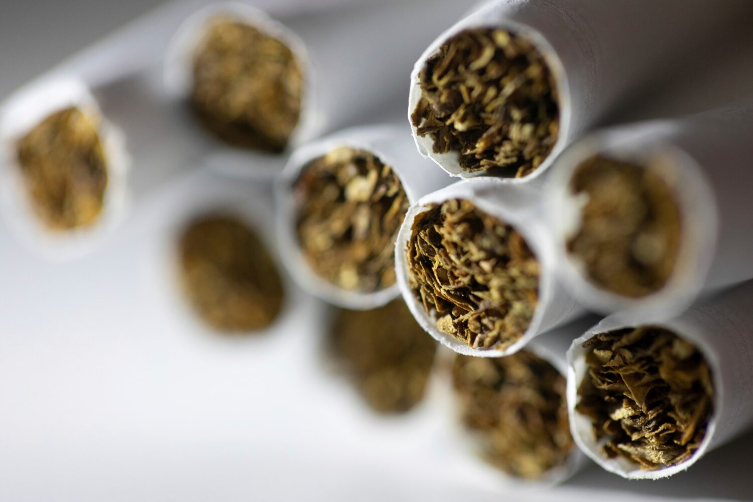 FILE - Cigarettes are arranged for a photograph in New York on Dec. 17, 2019. (AP Photo/Patrick Sis...