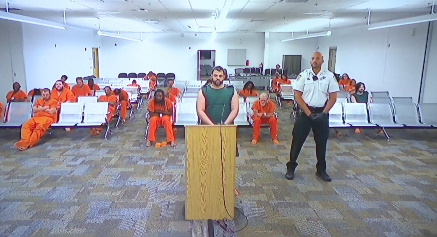 Hisham Abugharbieh, facing two counts of first-degree murder appears in court via video on Saturday...