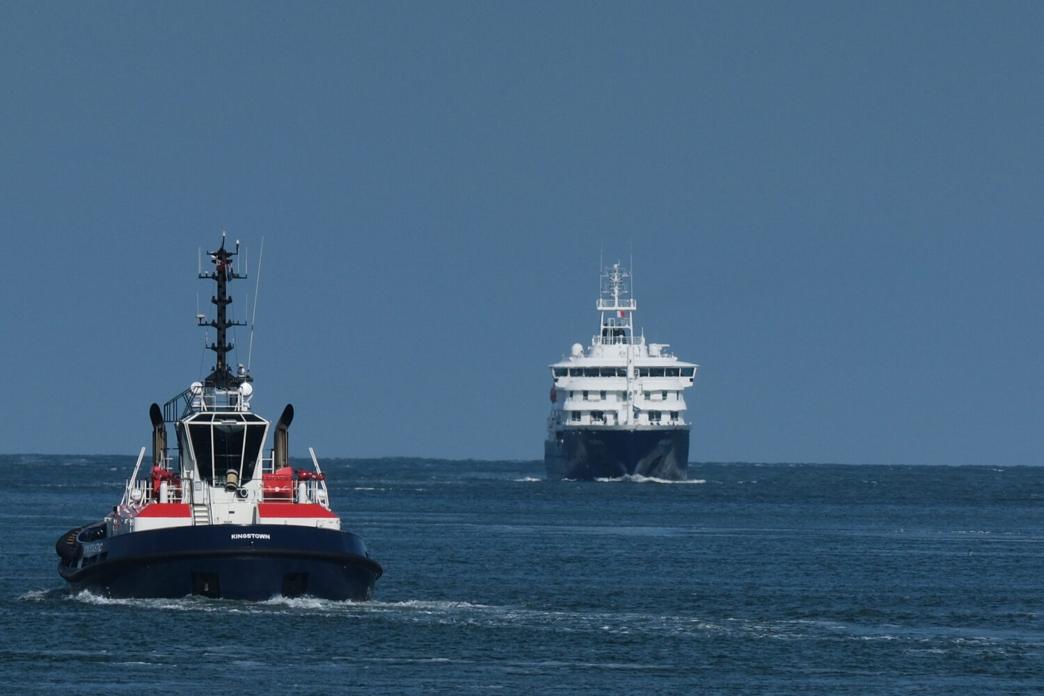The MV Hondius cruise ship, right, arrives at the Port of Rotterdam, Netherlands, Monday, May 18, 2...