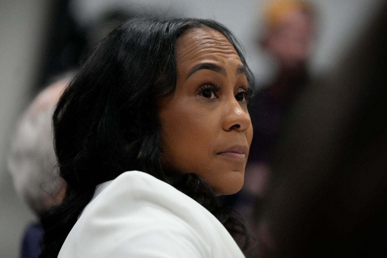 FILE - Fulton County District Attorney Fani Willis is seen at the Georgia State Capitol, Dec. 17, 2...