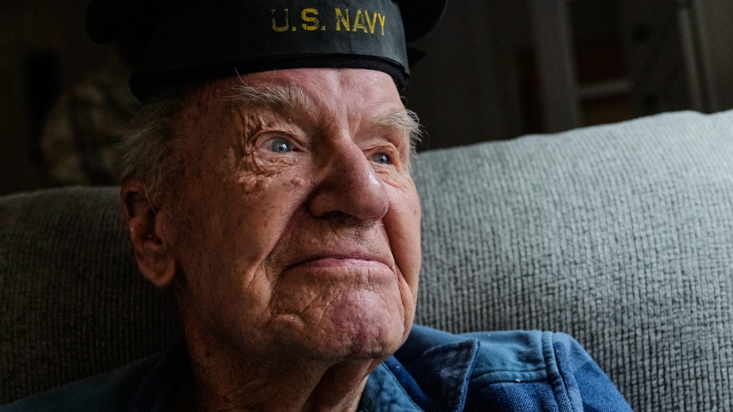Freeman K. Johnson, a 106-year-old Pearl Harbor survivor, listens to a question during an interview...