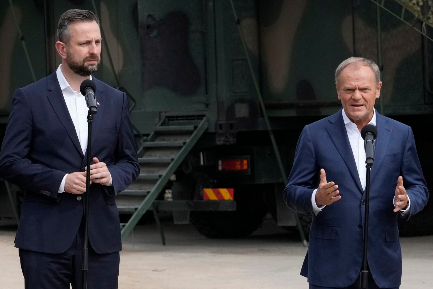 FILE - Poland's Prime Minister Donald Tusk, right, and Defense Minister Wladyslaw Kosiniak-Kamysz, ...