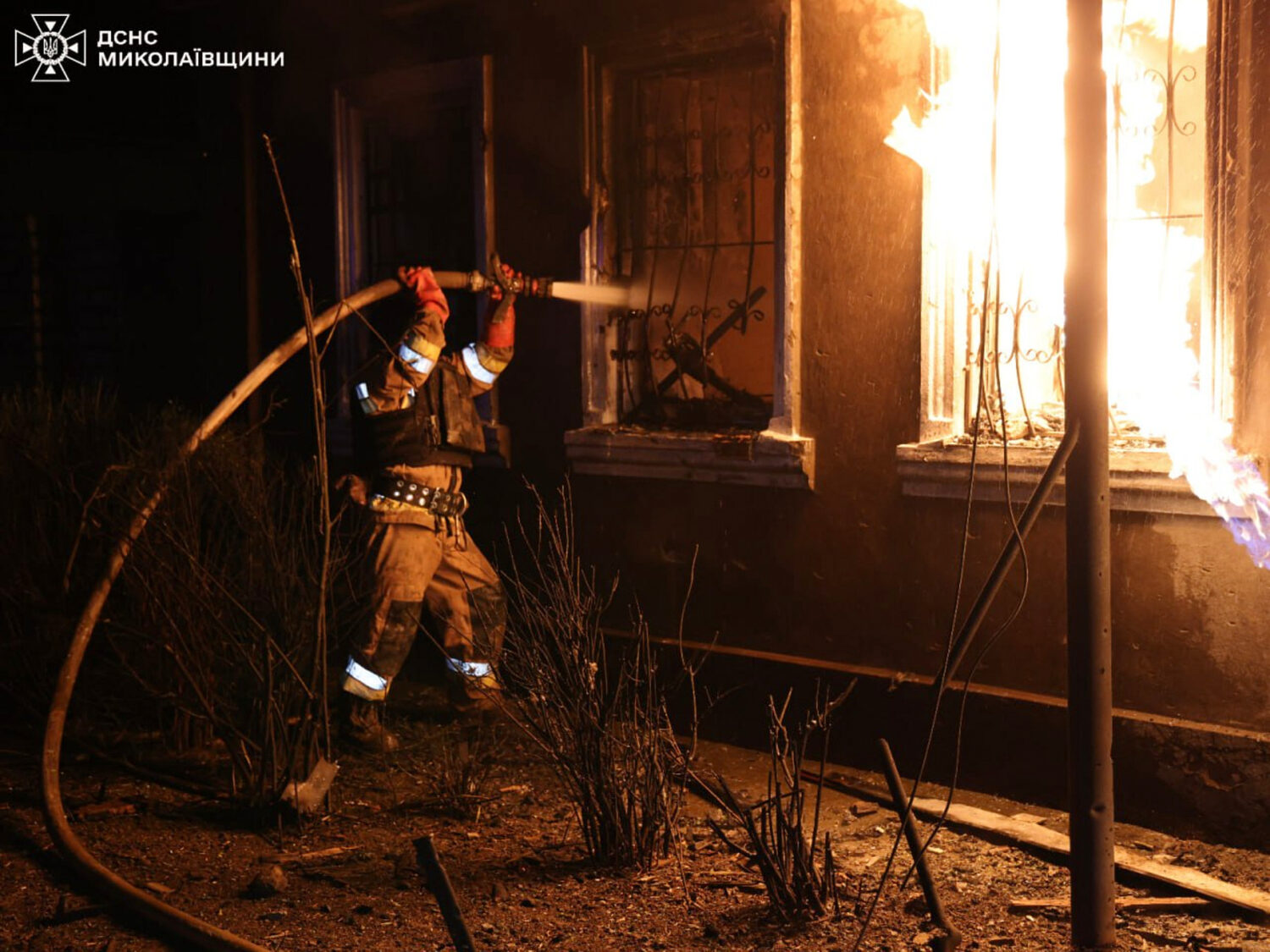 In this photo provided by the Ukrainian Emergency Service, firefighters put out a fire in a residen...
