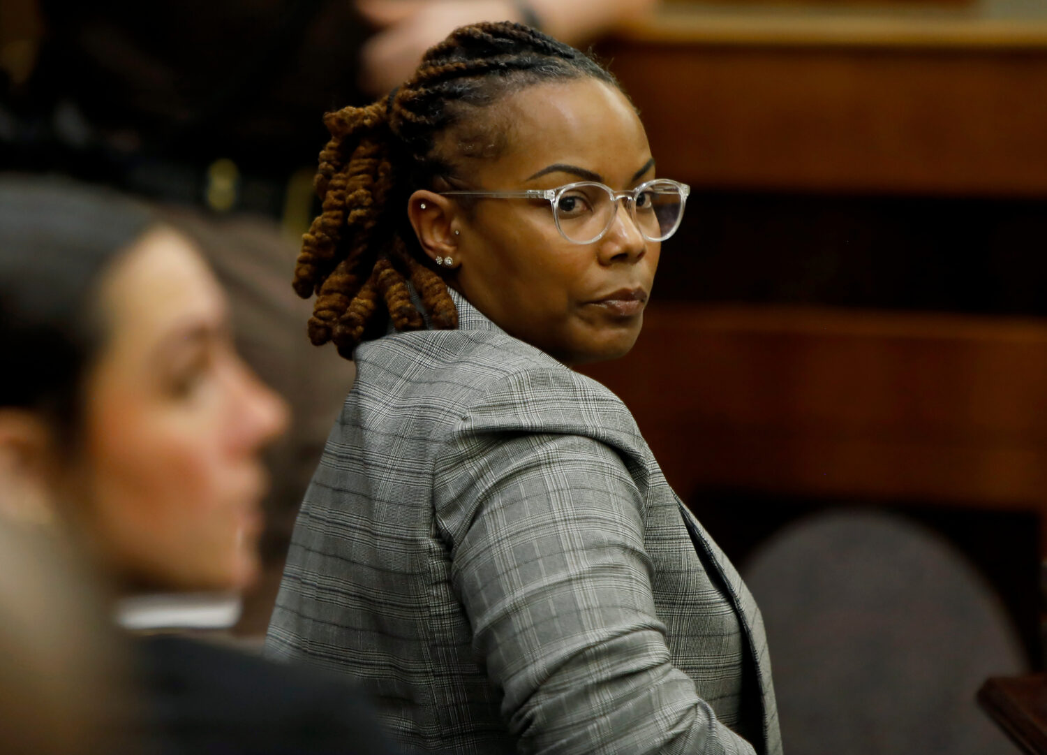 FILE - Former Richneck Elementary School assistant principal Ebony Parker looks back into the court...
