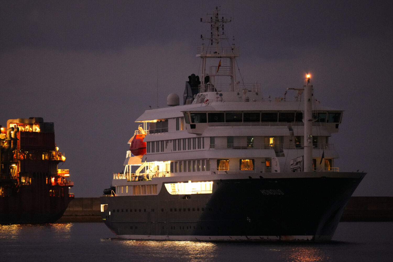 The hantavirus-stricken cruise ship MV Hondius is seen at anchor after arriving at the port of Gran...
