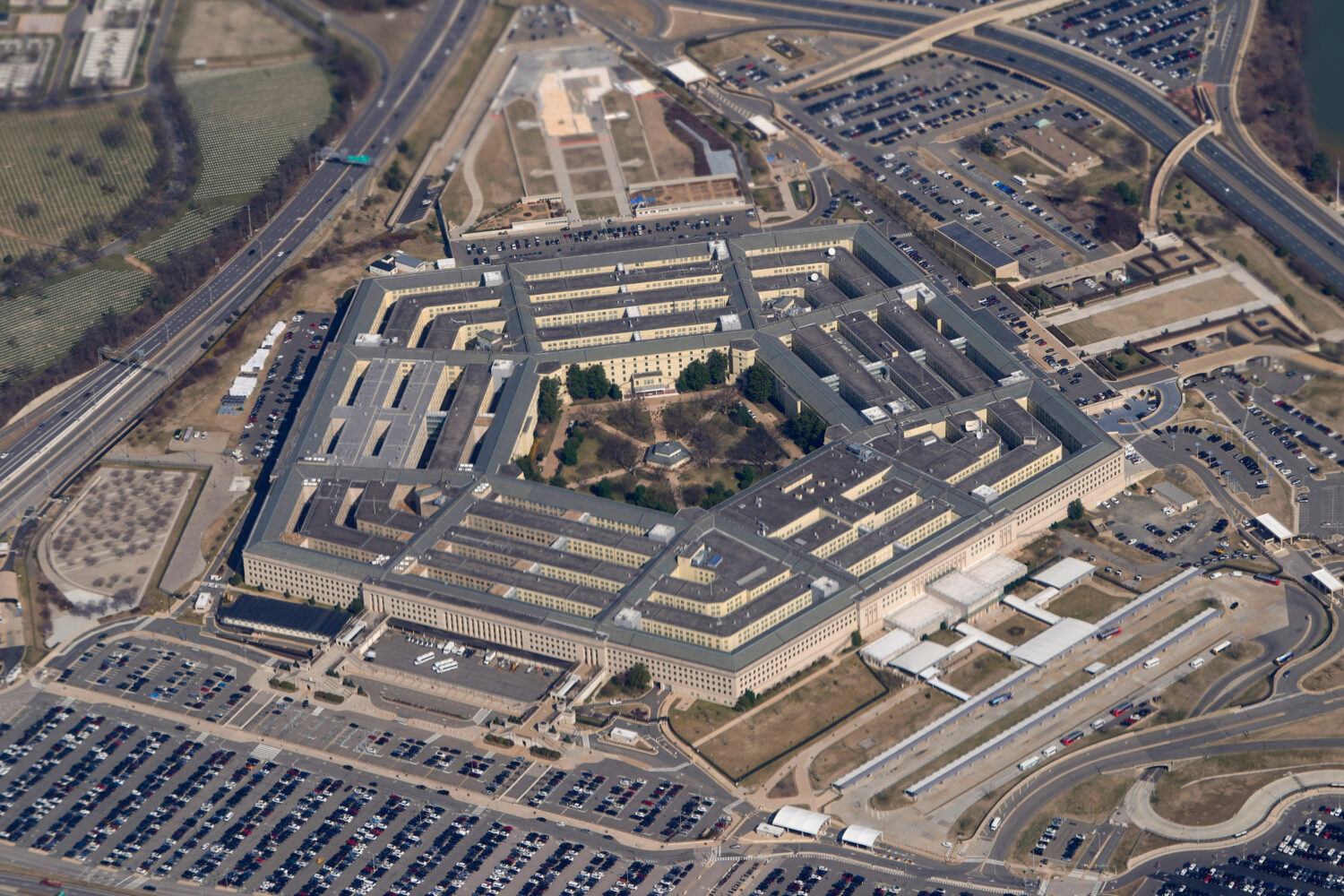 FILE - The Pentagon is seen from Air Force One as it flies over Washington, March 2, 2022. (AP Phot...