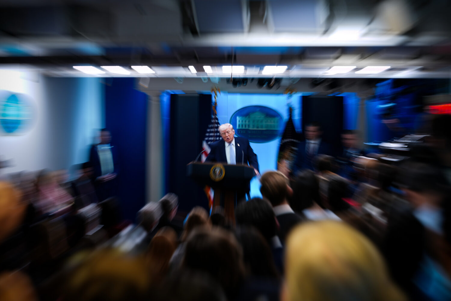 President Donald Trump, accompanied by Defense Secretary Pete Hegseth and Chairman of the Joint Chi...