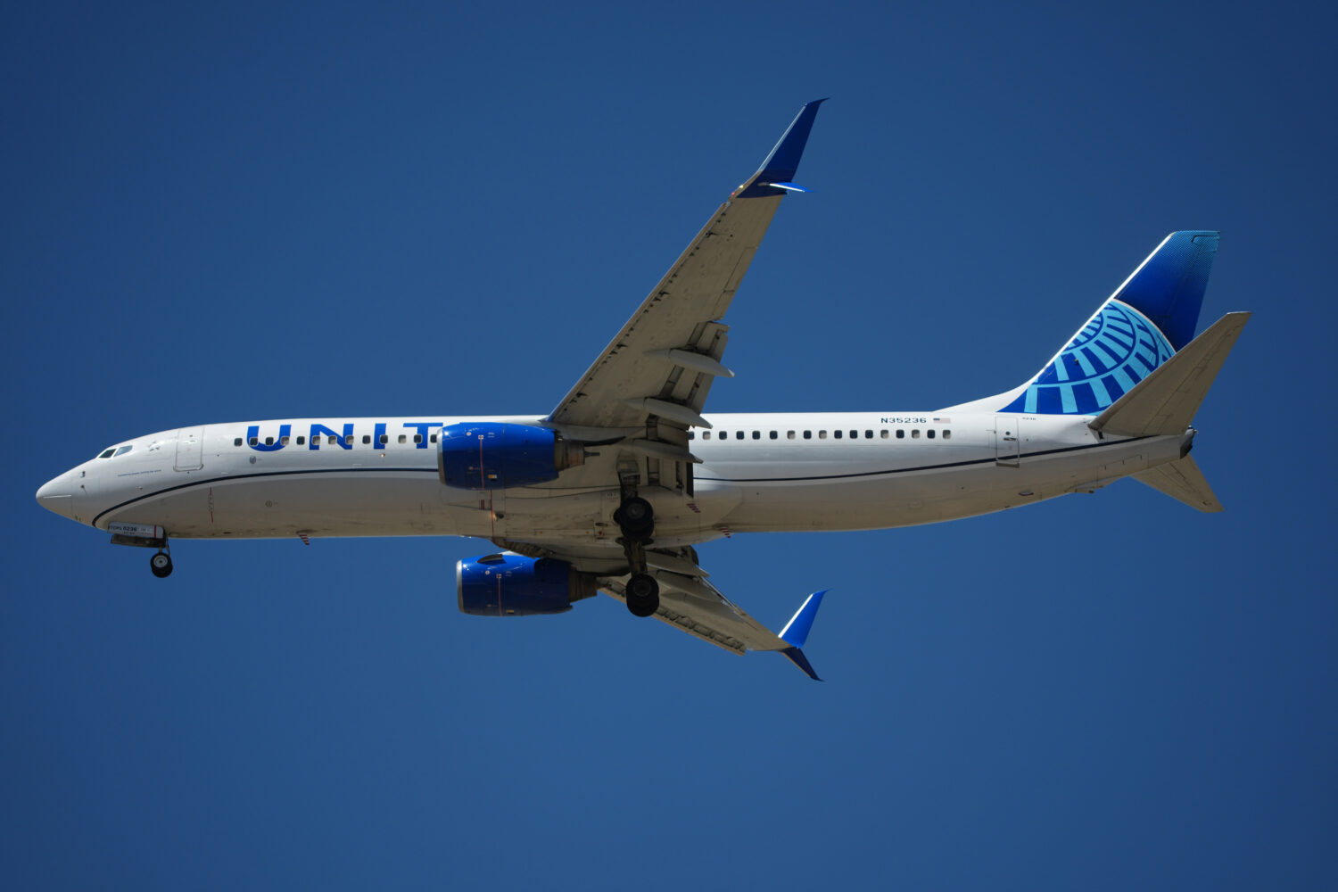 FILE - United Airlines jetliner prepares to land on a runway at Denver International Airport Monday...