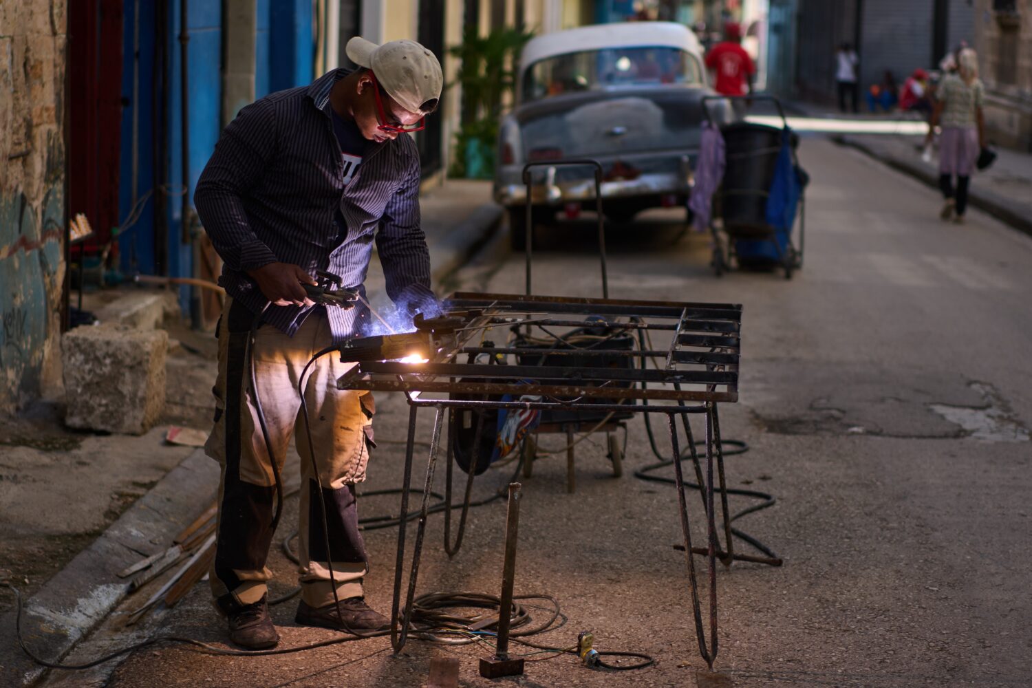 A blacksmith welds a door in Havana, Cuba, Tuesday, June 9, 2026. (AP Photo/Ramon Espinosa)Credit: ...