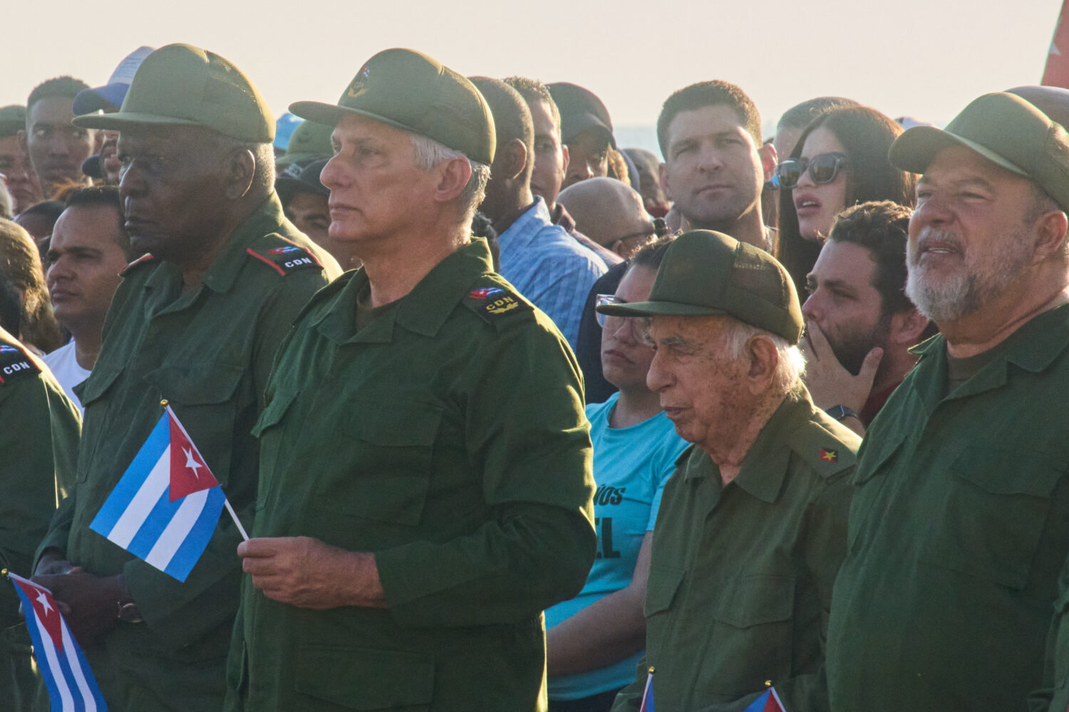 Cuba's President Miguel Diaz-Canel, second left, and Raul Castro's grandson Raul Guillermo Rodrigue...