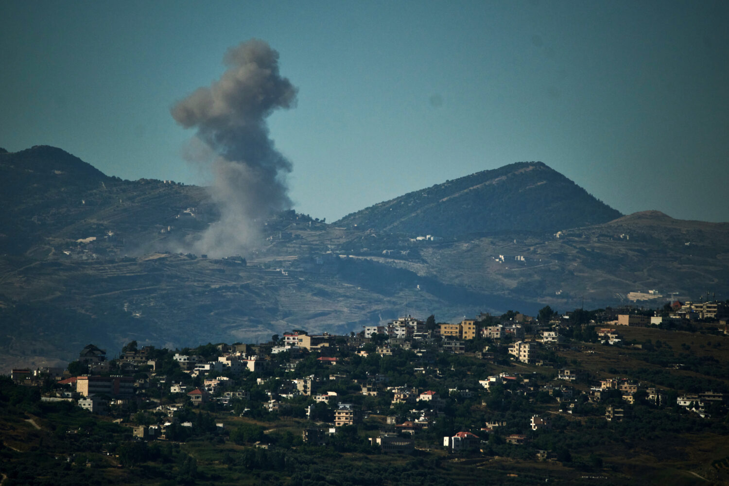 Smoke rises to the sky following an Israeli military strike in southern Lebanon as seen from northe...
