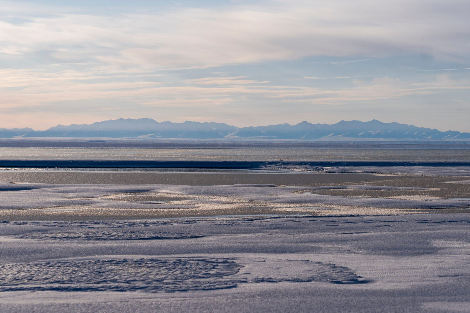 FILE - The Kaktovik Lagoon and the Brooks Range mountains of the Arctic National Wildlife Refuge ar...