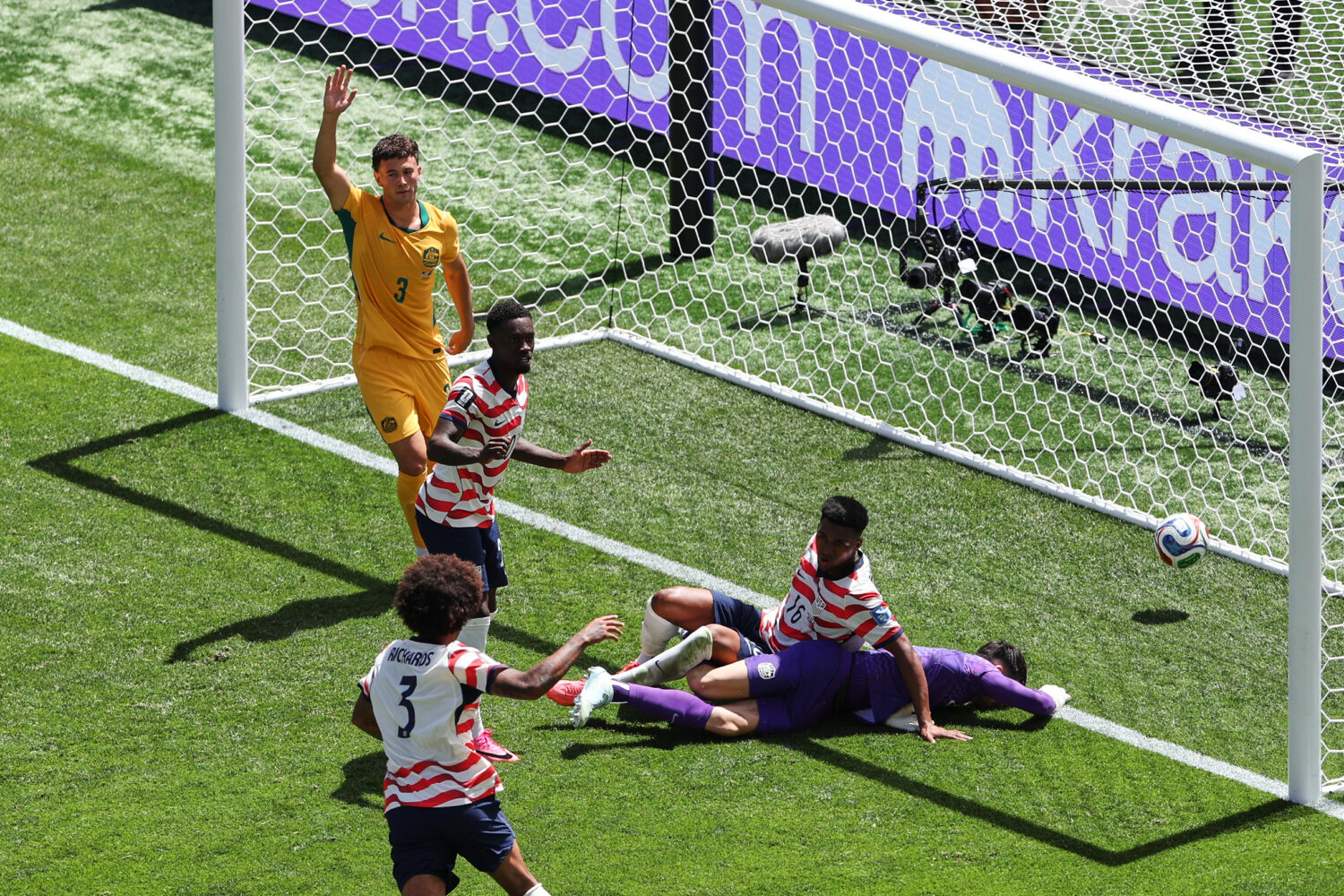 Australia's Aiden O'Neill (13) appeals for offside after United States' Alex Freeman (16) scored a ...