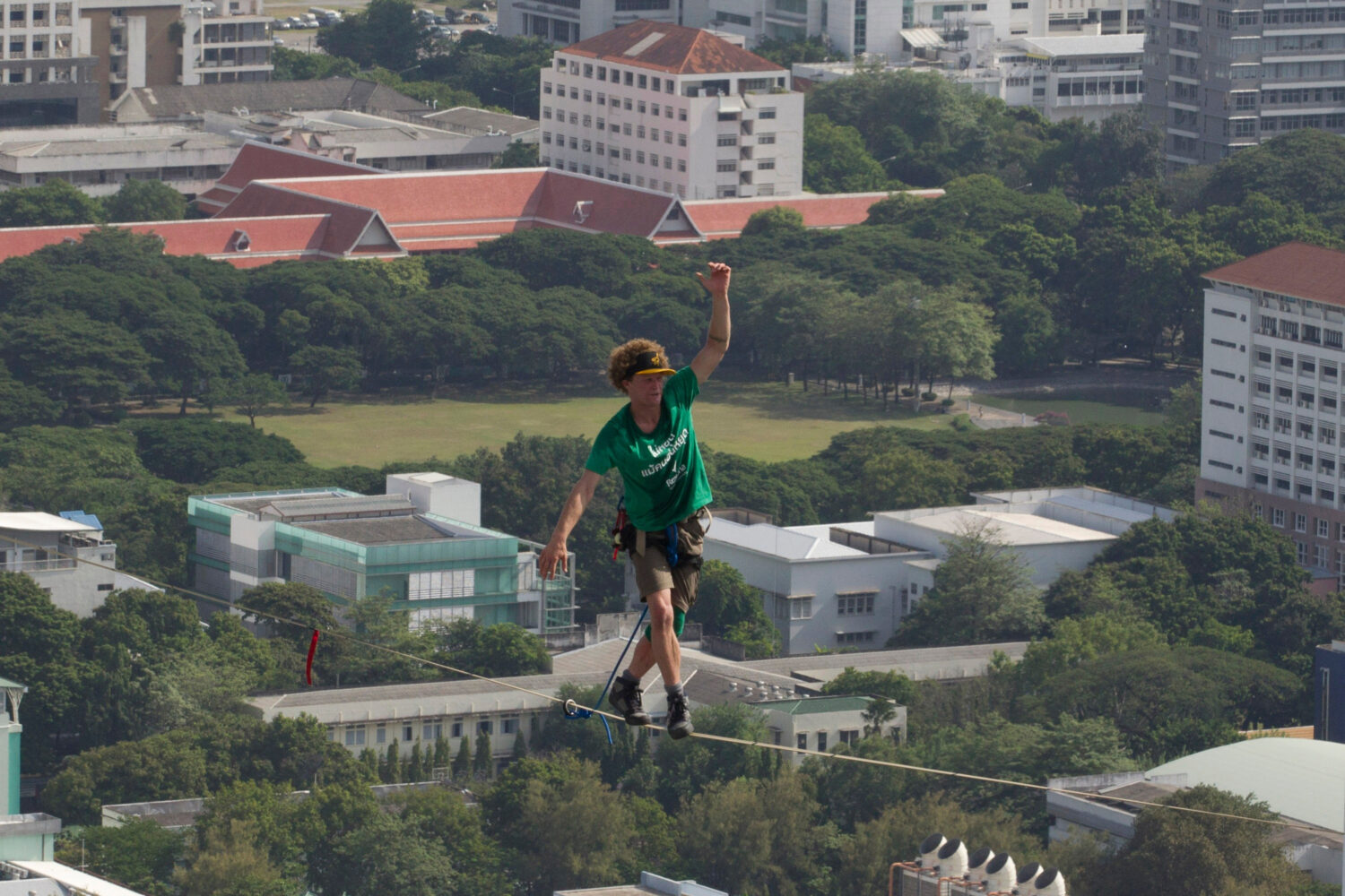 FILE - U.S. slackliner Andy Lewis of Calif. balances on a slackline in Bangkok, Thailand, July 23, ...