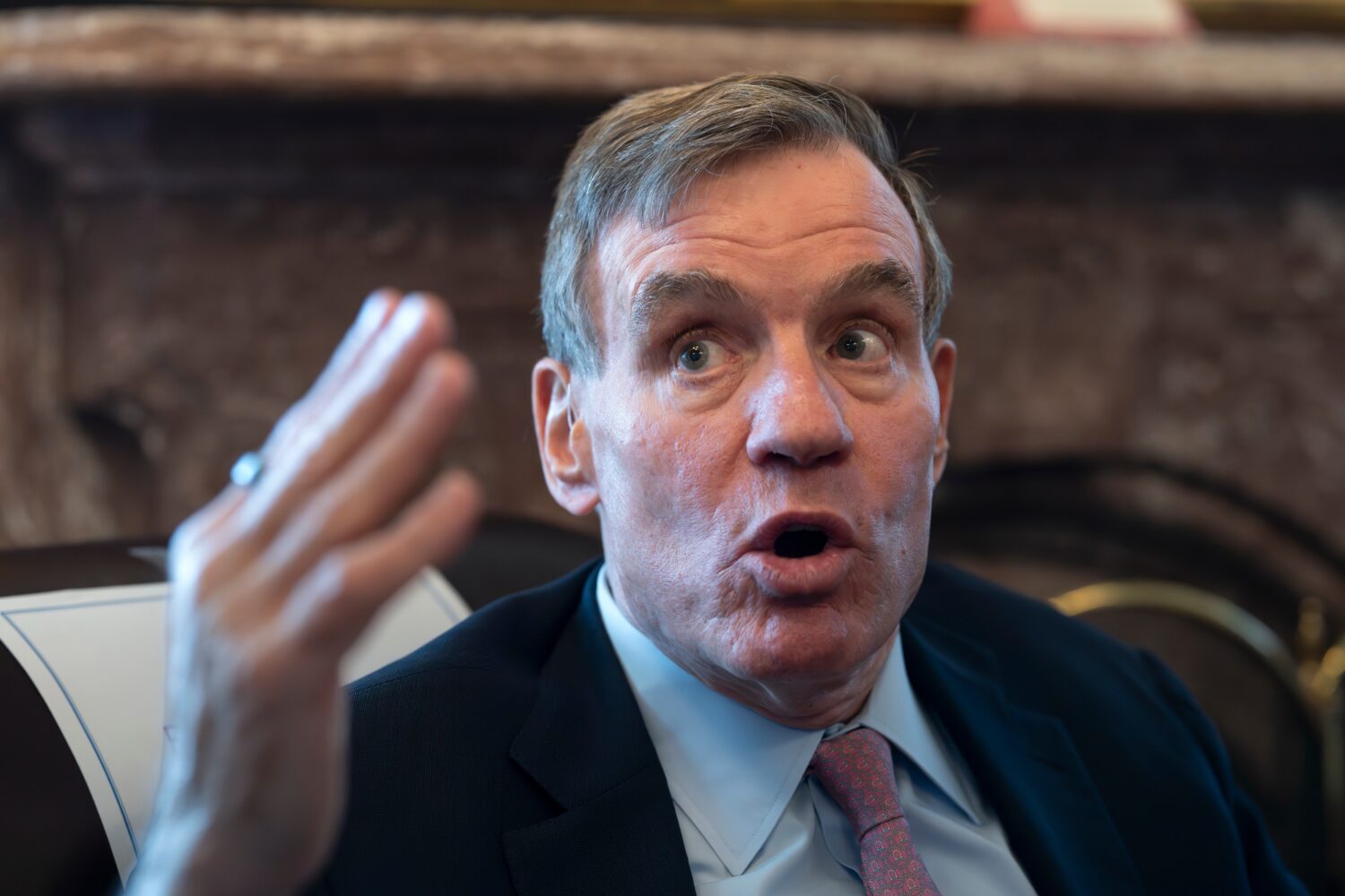 Sen. Mark Warner, D-Va., the vice chair of the Senate Intelligence Committee, speaks to reporters a...