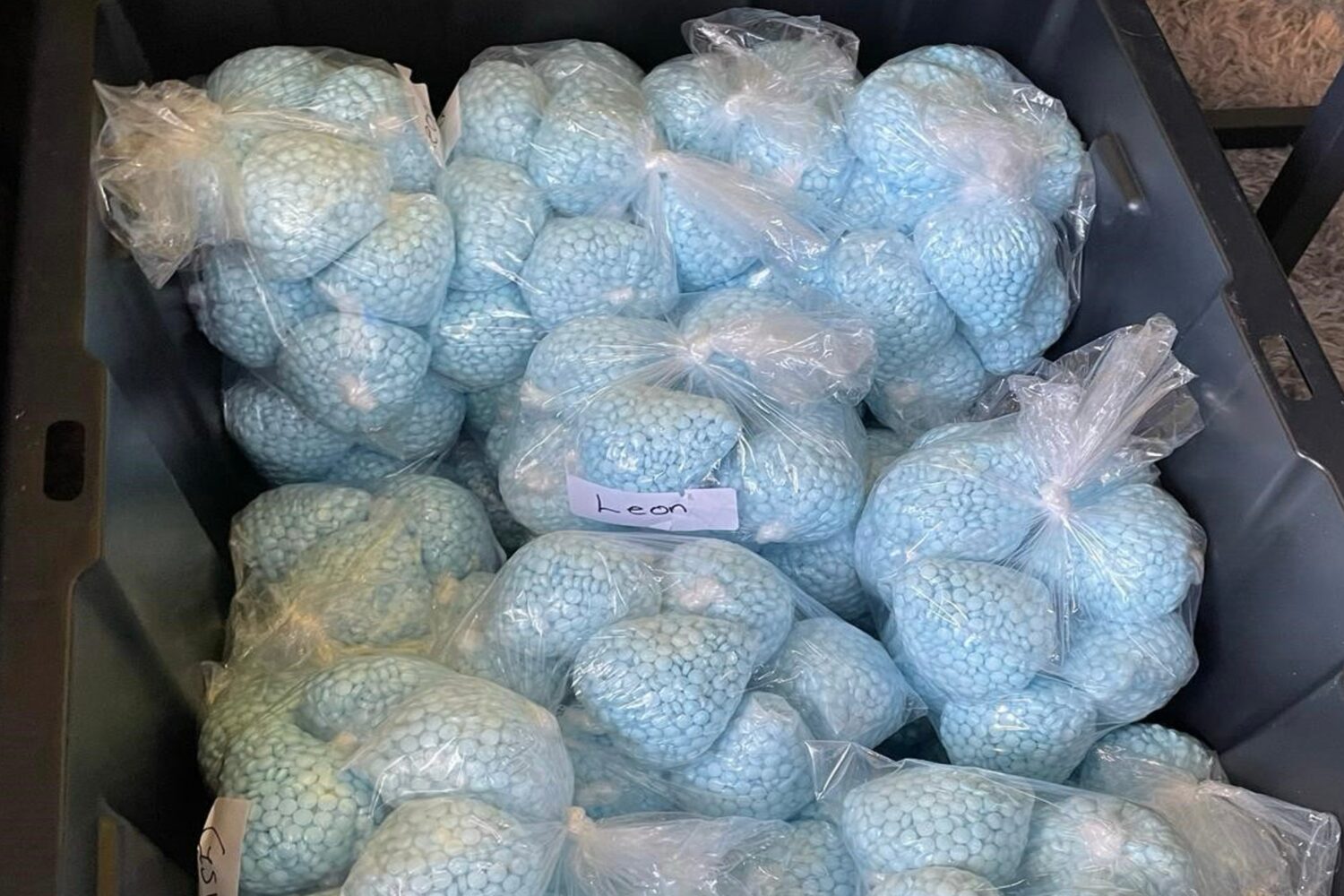 This photo provided by the U.S. Drug Enforcement Administration shows pills containing fentanyl whi...