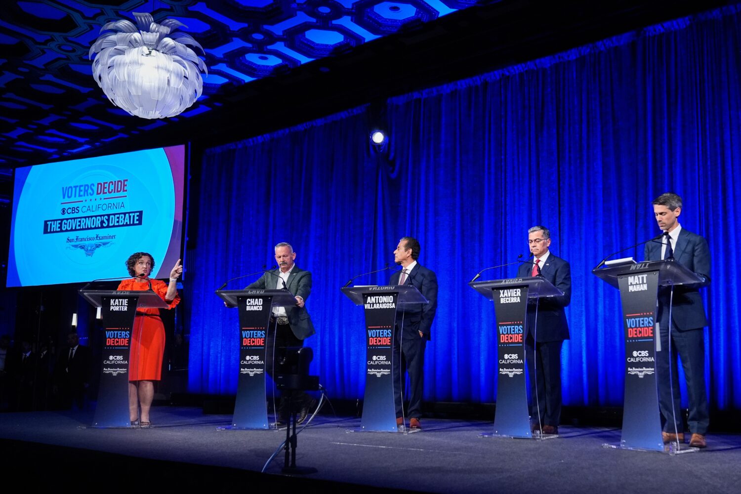 From left, Katie Porter speaks as Chad Bianco, Antonio Villaraigosa, Xavier Becerra and Matt Mahan ...