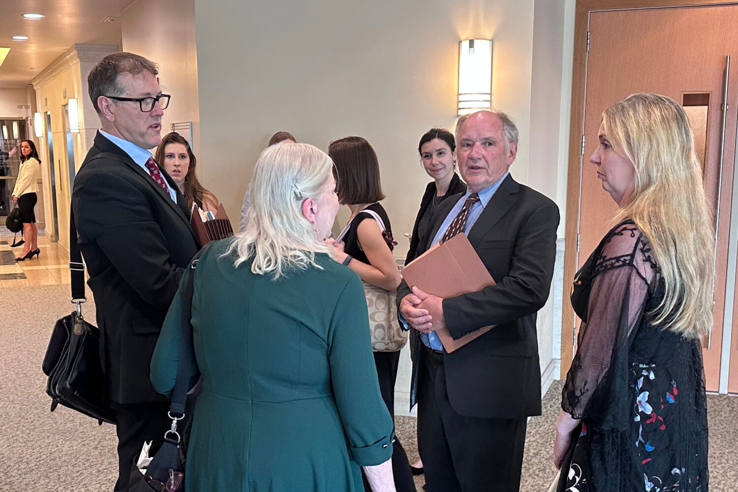 Jim Troupis, former campaign attorney for President Donald Trump, second from right, speaks with a ...