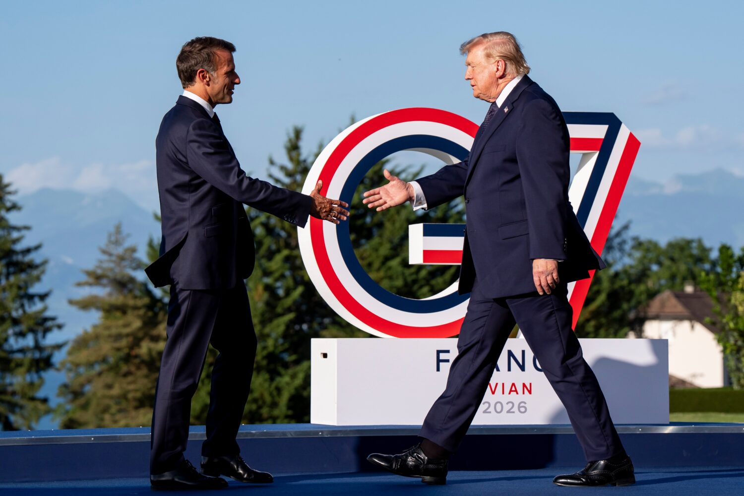 Emmanuel Macron, President of France, left, greets U.S. President Donald Trump during the G7 summit...
