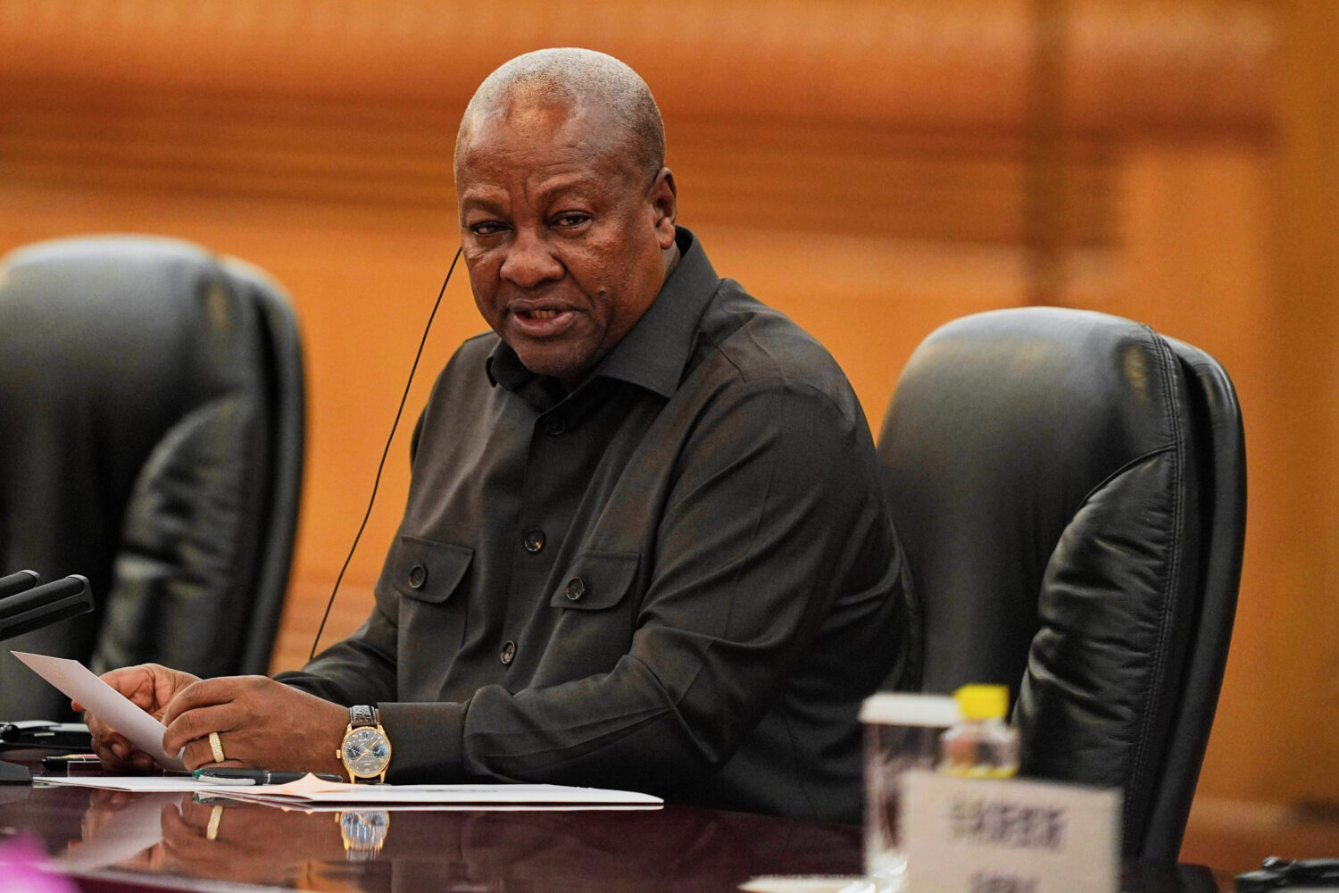 FILE - Ghana's President John Mahama speaks during a meeting with Chinese President Xi Jinping at t...