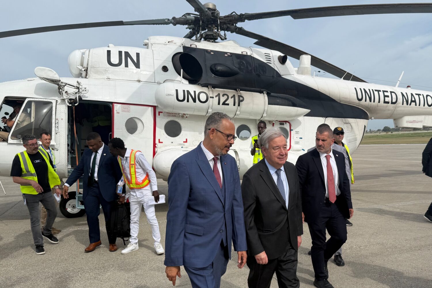 Haitian Prime Minister Alix Didier Fils-Aimé, front center, walks with U.N. Secretary-General Anto...