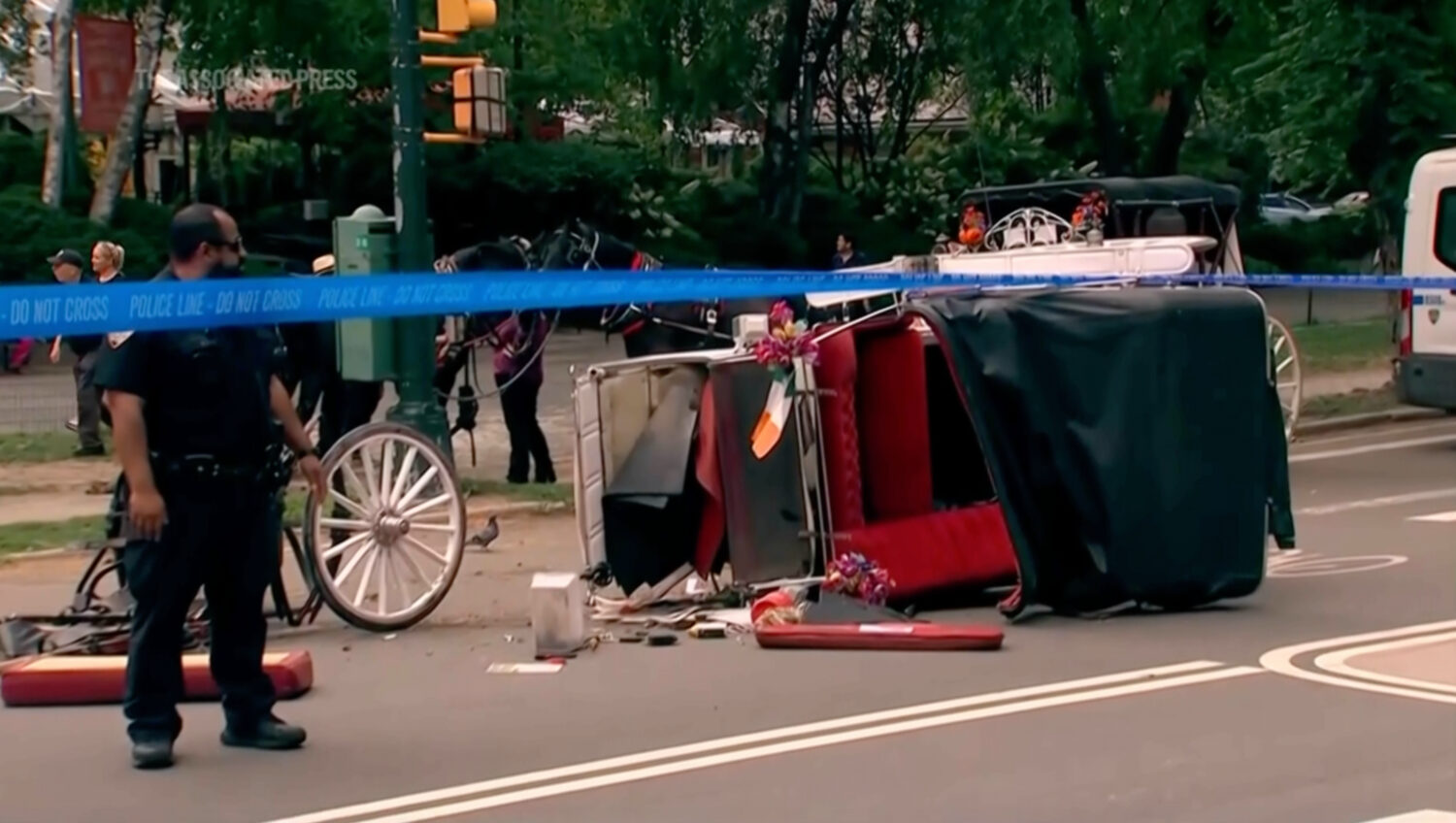 Police investigate the scene after a Central Park carriage horse bolted away from its driver killin...
