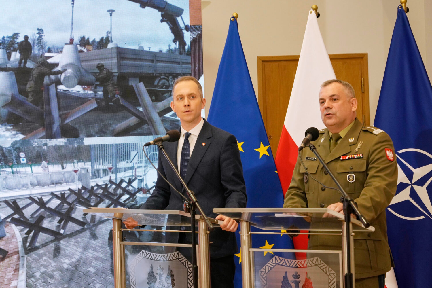 FILE - Gen. Wieslaw Kukula, the Polish armed forces chief of staff, right, and Deputy Defense Minis...