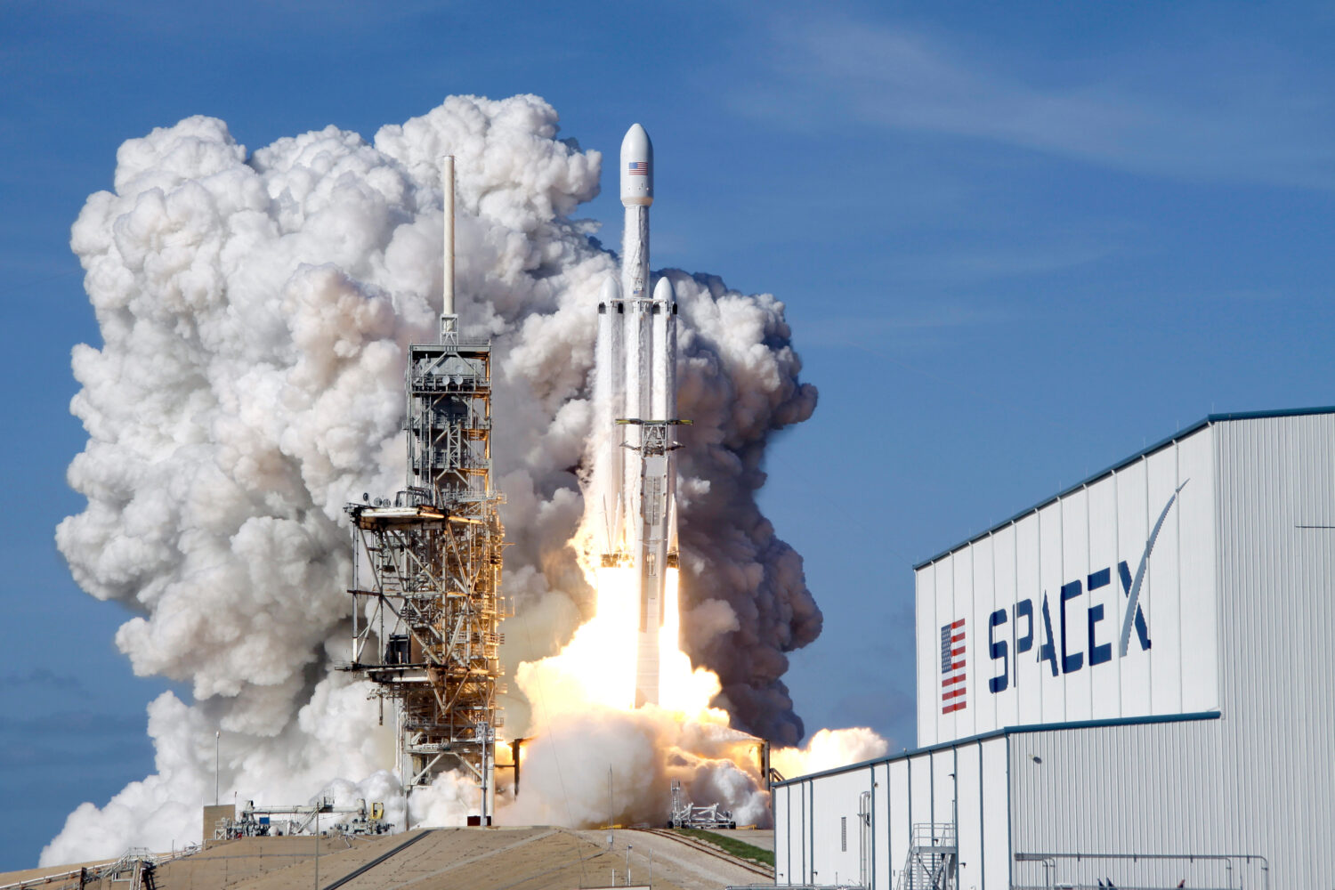FILE - A Falcon 9 SpaceX heavy rocket lifts off from pad 39A at the Kennedy Space Center in Cape Ca...