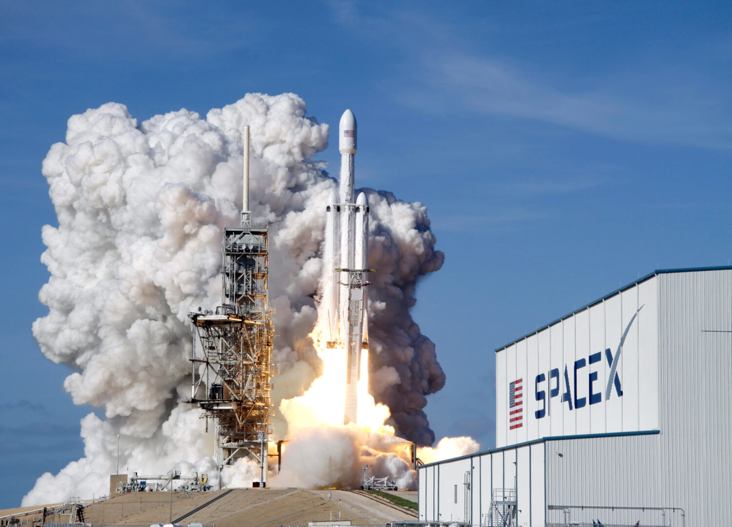 FILE - A Falcon 9 SpaceX heavy rocket lifts off from pad 39A at the Kennedy Space Center in Cape Ca...