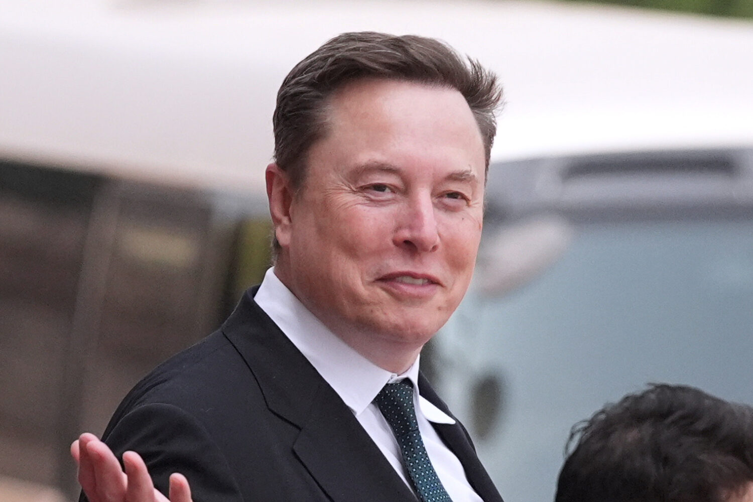 FILE - Elon Musk departs after a welcome ceremony with President Donald Trump and China's President...