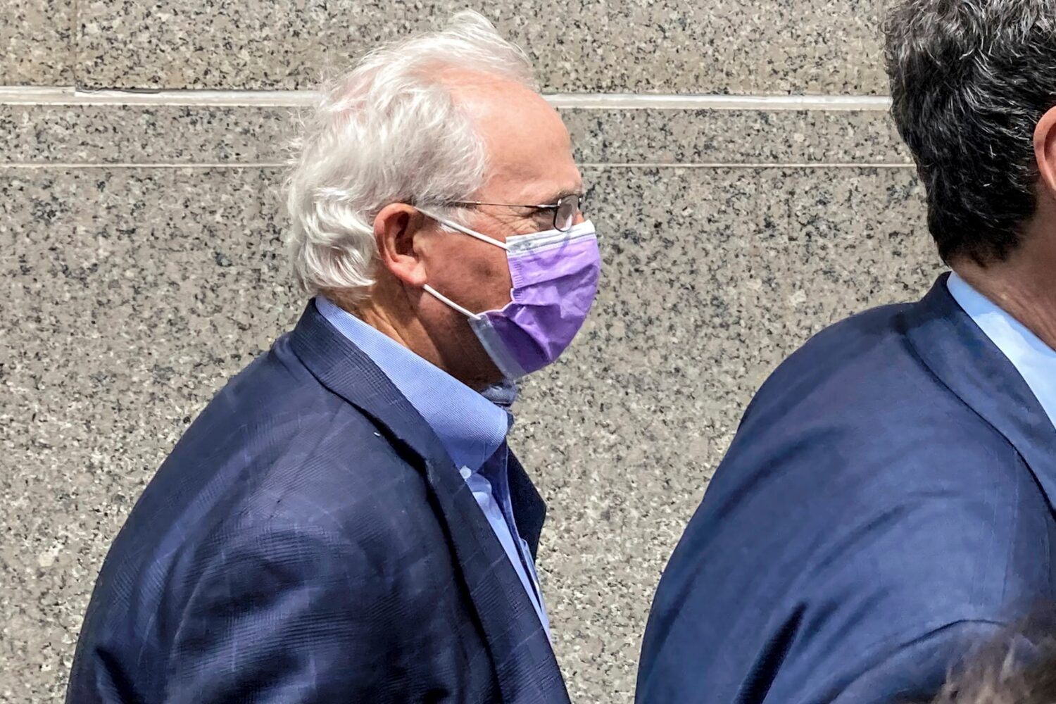 FILE — Former U.S. Rep. Stephen Buyer, left, trails his lawyer as he leaves Manhattan federal cou...