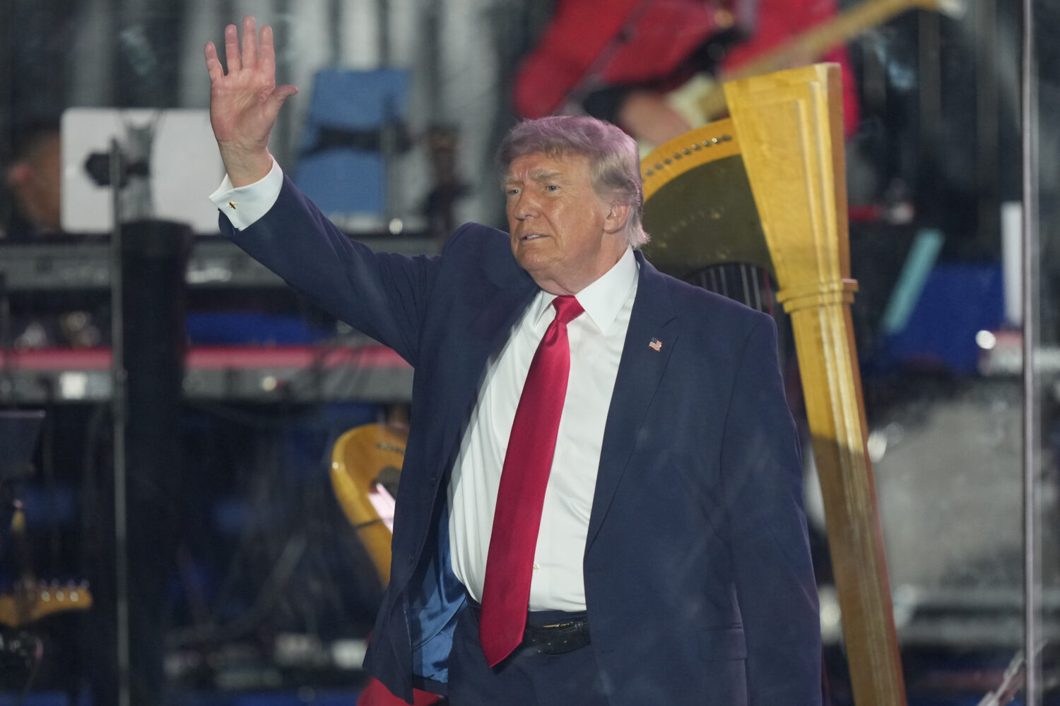President Donald Trump waves after speaking at the opening of the Great American State Fair on the ...