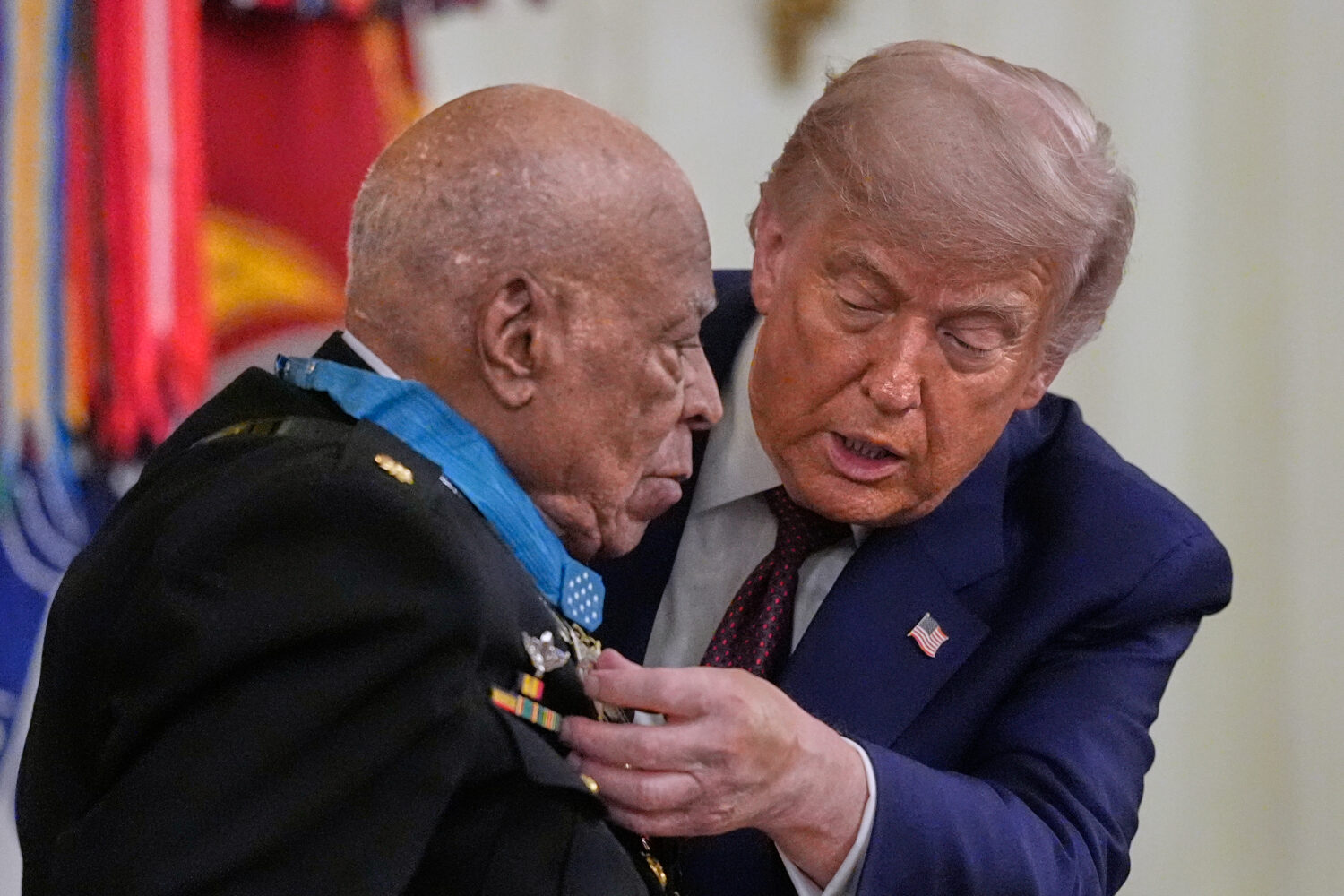 President Donald Trump presents the Medal of Honor to retired U.S. Marine Corps Maj. James Capers, ...