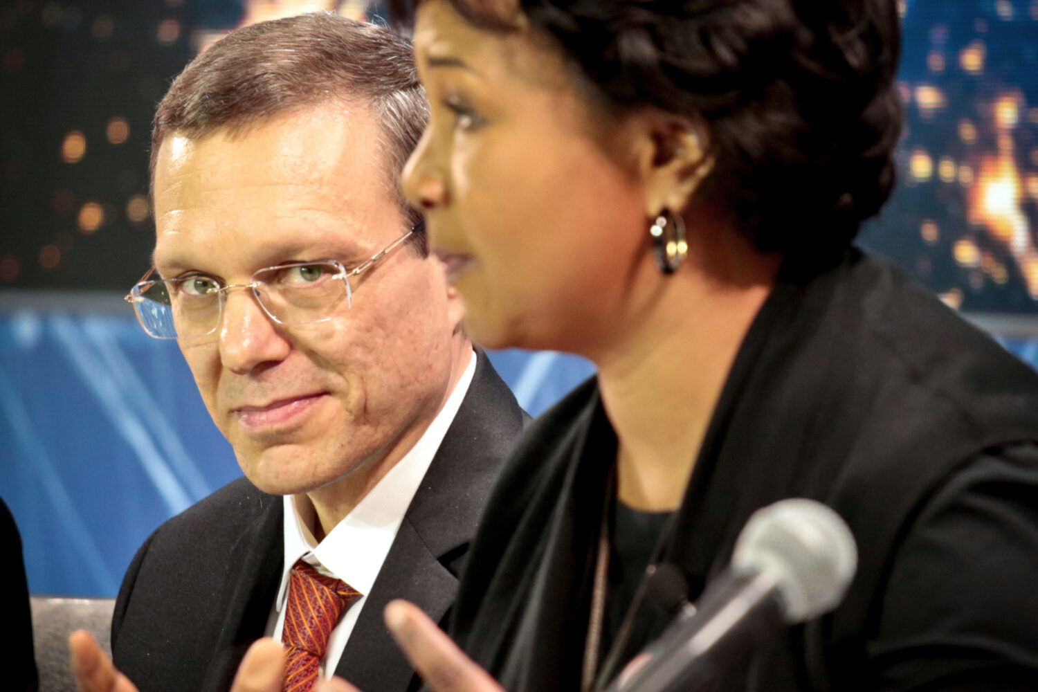 FILE - Harvard physicist Avi Loeb, left, listens as former NASA astronaut Dr. Mae C. Jemison speaks...