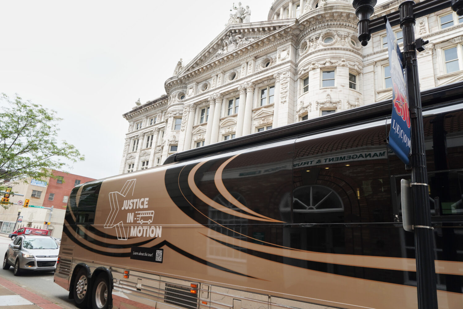 A tour bus carrying retired judges on a tour through the Rust Belt to defend judicial independence ...