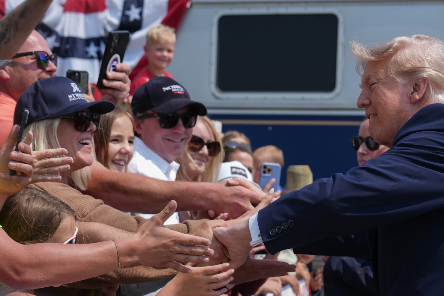 President Donald Trump greets supporters after arriving on a Freedom 250 train, Wednesday, July 1, ...